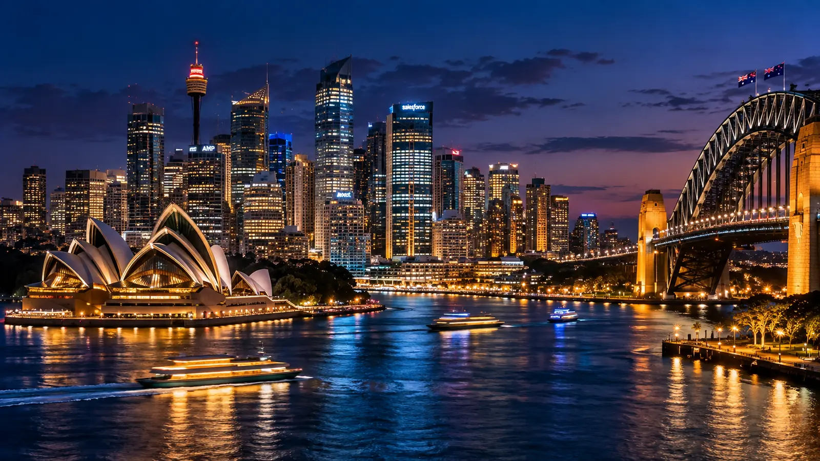 Sydney harbour at night with the city skyline lit up